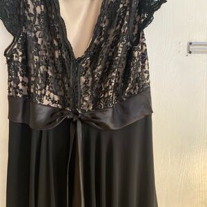 Black and tan dress with lace and sequins and hood for a party or night on town.